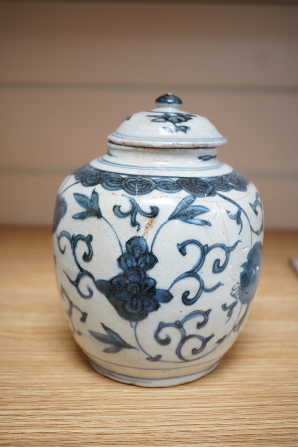 A Chinese blue and white Lion-dog jar and cover, late Ming dynasty, 17cm. Condition - poor